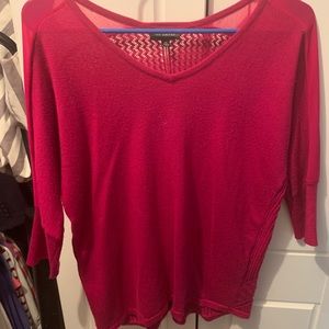 Magenta sweater with unique pattern on back